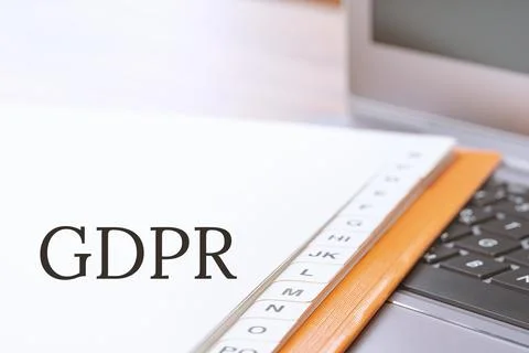 GDPR text on index file folder and laptop Stock Photos