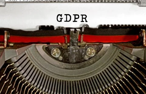 GDPR written with black ink using the typewriter.This is a regulation in Euro Фото