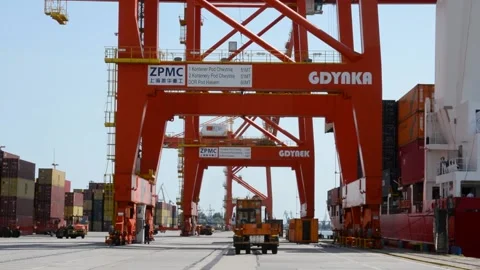 GDYNIA, POLAND - JULY 20, 2019: Overhead cranes in the harbor Stock Footage 141619829