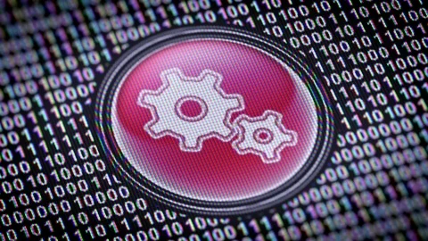 Gear icon. Binary code ( array of bits ) in the screen. Looping footage Stock Footage 110703842