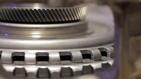 Gear mechanism process Rotating gears. works from within. movable clutch disc. Stock Footage 239474804