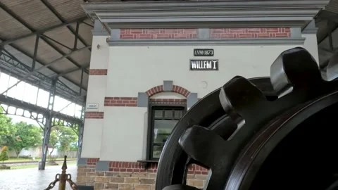 Gear Wheel from an ancient train which is a collection from the 1 year old Ra Stock Footage 201426913