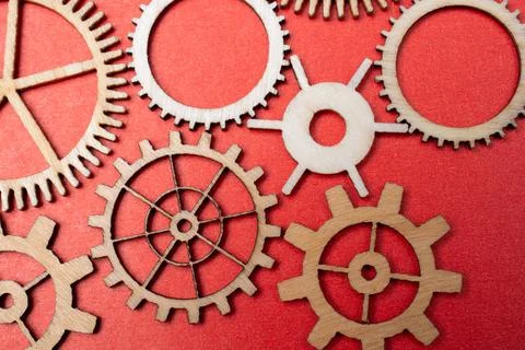 Gear wheels on red background as concept of engineering Foto stock