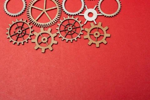 Gear wheels on white background as concept of engineering Stock Photos