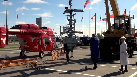 Gearbox hangs on cable of car crane for installation on Ka-226 helicopter. Stock Footage 106232419