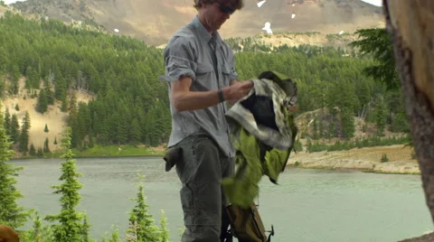 Gearing up for a hike Stock Footage 59006478