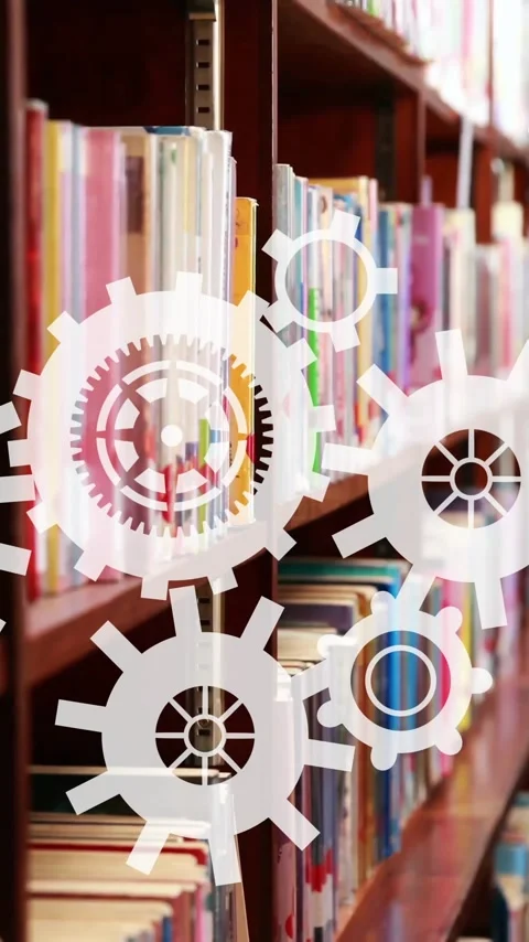 Gears and cogs animation over person reading book in library Stock Footage 319975913