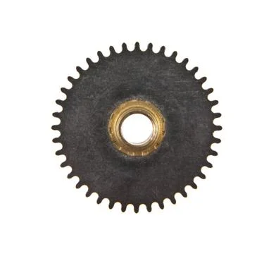 Gears for a clock isolated on a white background close-up Stock Photos