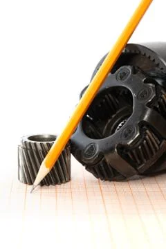 Gears On Graph Paper Stock Photos