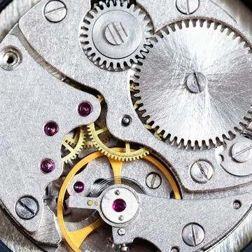 Gears of mechanical clockwork close up watchmaker workshop - gears of mech... Stock Photos