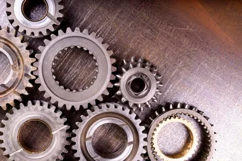 Gears on metal background Stock Photos