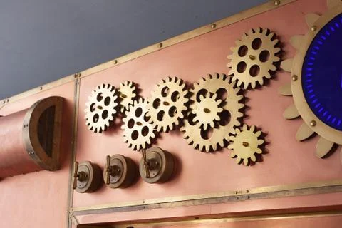Gears on the old style copper panel Stock Photos