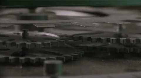 Gears spinning with pan 2 Stock Footage 35253083