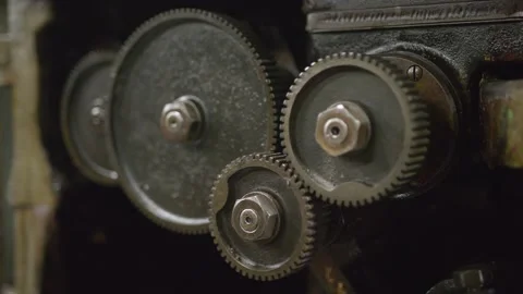 Gears Turning in Machine, Concept piece for thinking with brain, gritty cogs Stock Footage 136800166