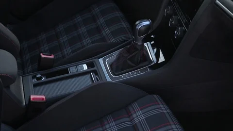 Gearshift, dashboard and armchairs with armrests in interior car Stock-Footage 85830392
