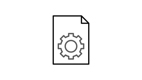 A gearwheel rests on top of a document, symbolizing mechanical proces.. Stock Footage 333550506