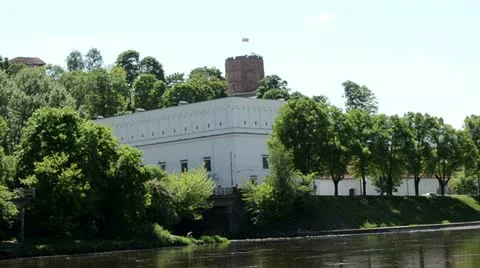 Gediminas castle tricolor lithuania flag. river neris flow Stock Footage 20434853