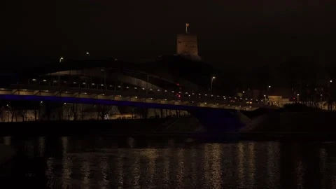 Gediminas Tower and Mindaugas Bridge at night in Vilnius, Lithuania Stock Footage 220774353