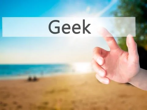 Geek - Hand pressing a button on blurred background concept on visual screen. 写真素材