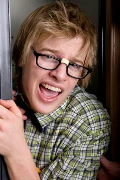 Geek in locker Stock Photos