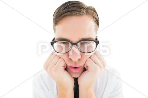 Geeky hipster falling asleep on hands Stock Photos