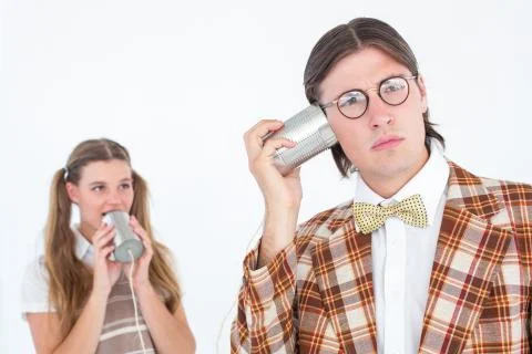 Geeky hipsters using string phone Stock Photos