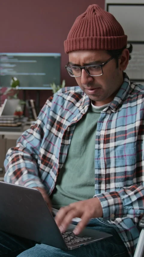 Geeky Indian Male Programmer Working on Code in Office Stock Footage 286073406