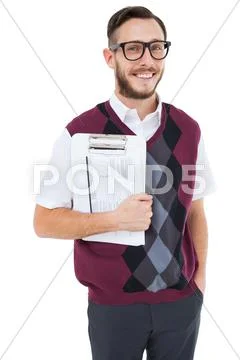 Geeky man holding clipboard in vest Stock Photos