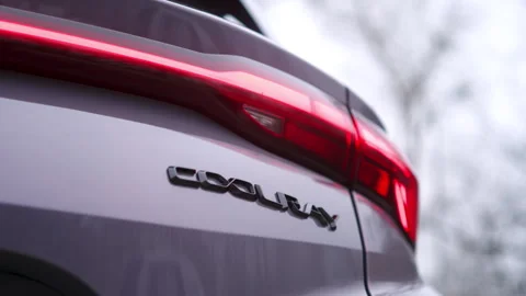 Geely Coolray car as its exquisite tail lights radiate a stunning display of Stock Footage 263313338