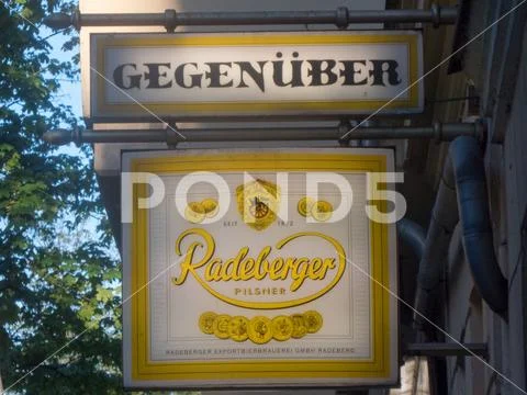 Gegenüber restaurant signboard, Berlin, Germany Stock Photos
