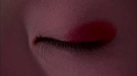 Geisha having eyeliner applied Stock Footage 54374892