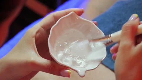 Gel mixing for spa procedure Stockbeeldmateriaal 318101095