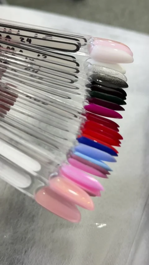 Gel nail polish color sample palette for manicure, professional nail salon Stock Footage 345172936