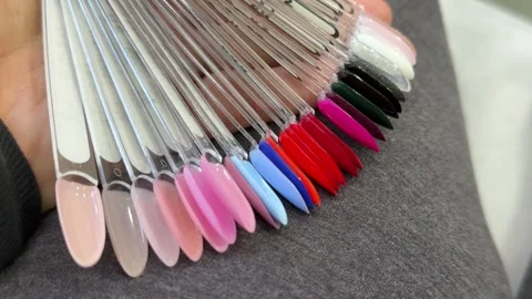 Gel nail polish color sample palette for manicure, professional nail salon Stock Footage 345180420