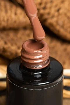 Gel nail Polish. Manicure. A drop drips from the brush. Stock Photos