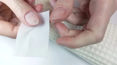 Gel polish manicure step-by-step video tutorial. Step 5 nail prep dehydrator Stock Footage 277358287