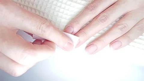 Gel polish manicure step-by-step video tutorial. Step 5 nail prep dehydrator Video stock 277359139