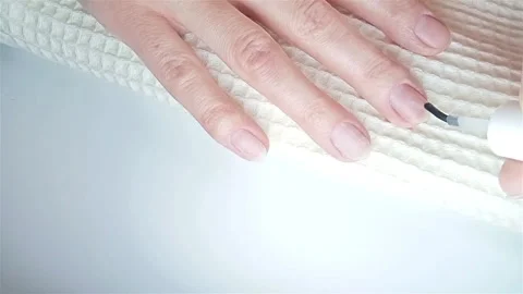 Gel polish manicure step-by-step video tutorial. Step 6 Primer ultra-bond  Video stock 277359965
