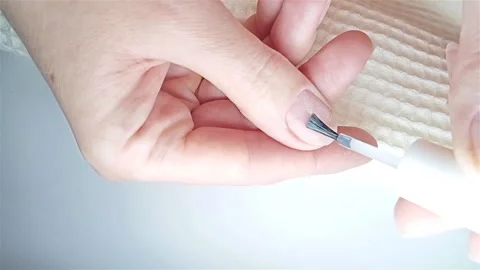 Gel polish manicure step-by-step video tutorial. Step 6 Ultra-bond applying Video stock 277359968