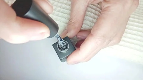 Gel polish manicure step-by-step video tutorial. Step 7 Nails base coat Stock Footage 277361116
