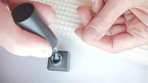 Gel polish manicure step-by-step video tutorial. Step 7 Nails base coat Stock Footage 279678959