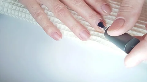 Gel polish manicure step-by-step video tutorial. Step 7 Nails base coat Video stock 279726719