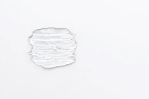 Gel texture of the emulsion on a white background. Clear cream swatch and copy Stock Photos