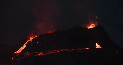 Geldingadalir volcano exploding hot magma from crater at night in Iceland Stock Footage 151284689