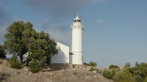Gelidonya lighthouse on a background of mountains. Drone footage 4K Stock Footage 133081806