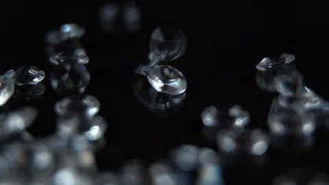 Gem stone falling into frame close up Video stock 123857634