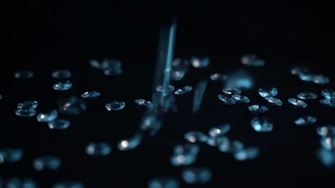 Gem stones falling on black background Stock Footage 127219193