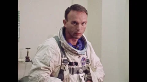 Gemini 10 astronaut Michael Collins suiting up Stock Footage 263445008