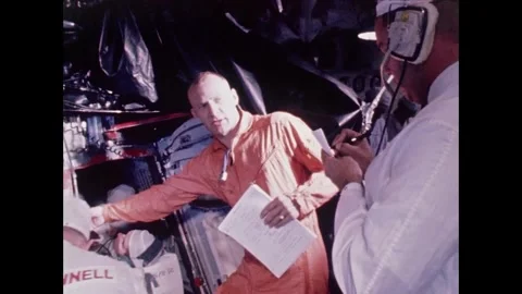 Gemini 12 astronaut Buzz Aldrin checking space capsule Stock Footage 263444793