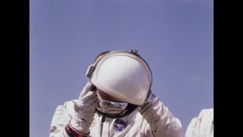 Gemini 8 crew Armstrong and Scott posing in flight suits Stock Footage 263445158